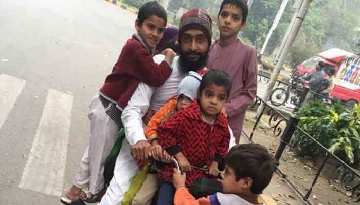 Man fined for riding motorcycle with nine children