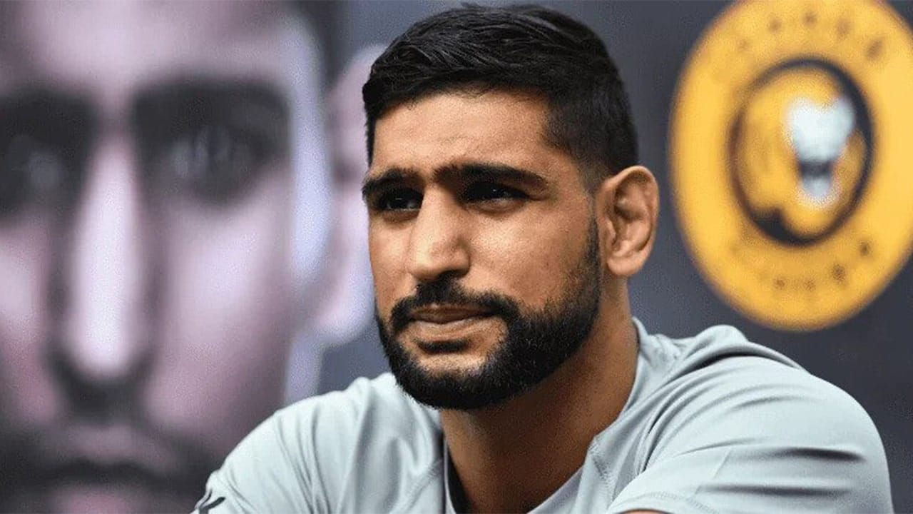 ‘I am helpless’: boxer Amir Khan opens up on war on Gaza